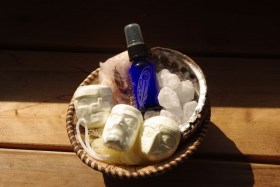 Sculpted Native Mask bath fizzers with essential oil mister in antique basket